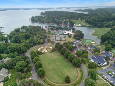 Ideally situated on a picturesque 1-acre lot in Lake Norman's on Trump National Golf Club Charlotte in North Carolina - for sale on GolfHomes.com, golf home, golf lot