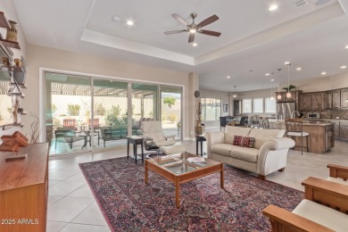 Showcasing a perfect blend of sophistication  comfort, David on Estrella Mountain Ranch Golf Course in Arizona - for sale on GolfHomes.com, golf home, golf lot