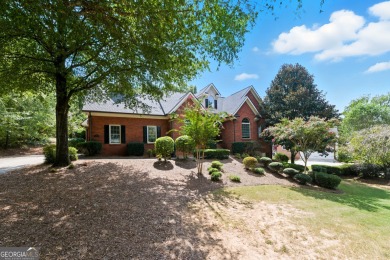 Step inside to find gleaming hardwood floors throughout the main on Chapel Hills Golf and Country Club in Georgia - for sale on GolfHomes.com, golf home, golf lot