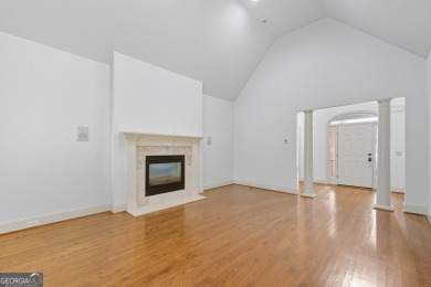 Step inside to find gleaming hardwood floors throughout the main on Chapel Hills Golf and Country Club in Georgia - for sale on GolfHomes.com, golf home, golf lot