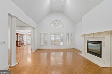 Step inside to find gleaming hardwood floors throughout the main on Chapel Hills Golf and Country Club in Georgia - for sale on GolfHomes.com, golf home, golf lot