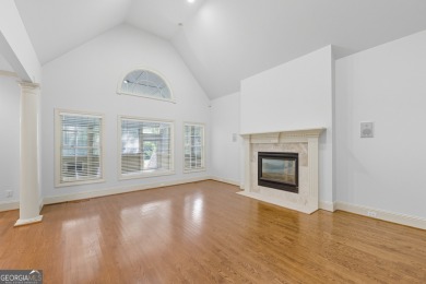 Step inside to find gleaming hardwood floors throughout the main on Chapel Hills Golf and Country Club in Georgia - for sale on GolfHomes.com, golf home, golf lot