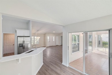 Step into this home and you will be blown away with it's high on Plantation Golf Club in Florida - for sale on GolfHomes.com, golf home, golf lot