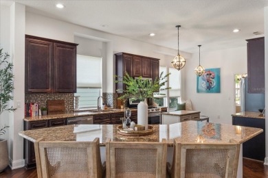 Nestled in the heart of West Park Village, this charming on Westchase Golf Club in Florida - for sale on GolfHomes.com, golf home, golf lot