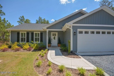 Pristine One Level Living on 1 Acre in the gated community of 7 on Seven Lakes Country Club in North Carolina - for sale on GolfHomes.com, golf home, golf lot