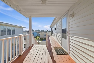 Just a short walk to the Atlantic ocean, this spacious raised on Tupelo Bay Golf Complex  in South Carolina - for sale on GolfHomes.com, golf home, golf lot