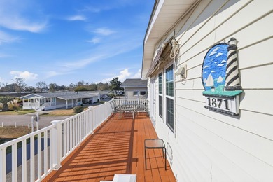 Just a short walk to the Atlantic ocean, this spacious raised on Tupelo Bay Golf Complex  in South Carolina - for sale on GolfHomes.com, golf home, golf lot