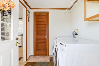 Just a short walk to the Atlantic ocean, this spacious raised on Tupelo Bay Golf Complex  in South Carolina - for sale on GolfHomes.com, golf home, golf lot