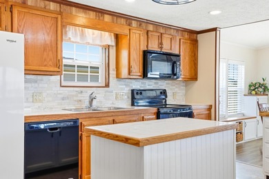 Just a short walk to the Atlantic ocean, this spacious raised on Tupelo Bay Golf Complex  in South Carolina - for sale on GolfHomes.com, golf home, golf lot