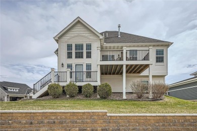 Nestled atop a corner lot, this beautiful sunlit property is on Southern Hills Golf Club in Minnesota - for sale on GolfHomes.com, golf home, golf lot