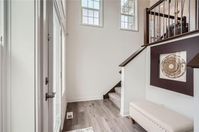 Nestled atop a corner lot, this beautiful sunlit property is on Southern Hills Golf Club in Minnesota - for sale on GolfHomes.com, golf home, golf lot