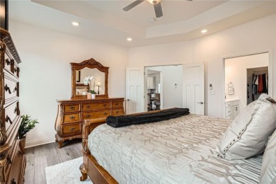 Nestled atop a corner lot, this beautiful sunlit property is on Southern Hills Golf Club in Minnesota - for sale on GolfHomes.com, golf home, golf lot