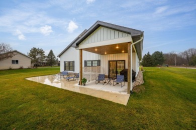 Newly constructed in 2023, barrier-free ranch home, offering the on Canadian Lakes Country Club-The Royal Course in Michigan - for sale on GolfHomes.com, golf home, golf lot