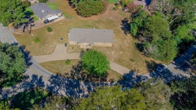 This 3 bedroom, 2 bath, brick home is the perfect home for a on Hide-A-Way Lake Golf Course in Texas - for sale on GolfHomes.com, golf home, golf lot