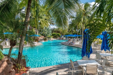 This furnished first-floor unit has new flooring, new stainless on The Rookery At Marco in Florida - for sale on GolfHomes.com, golf home, golf lot