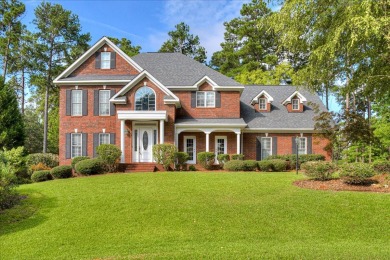This stately, two-story brick home sits up on a hill overlooking on Tara Golf Club At Savannah Lakes in South Carolina - for sale on GolfHomes.com, golf home, golf lot