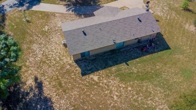 This 3 bedroom, 2 bath, brick home is the perfect home for a on Hide-A-Way Lake Golf Course in Texas - for sale on GolfHomes.com, golf home, golf lot