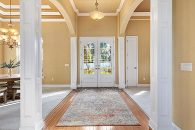 LAKES OF LADY LAKE - Executive-style Biscayne Custom on Lakes of Lady Lake Golf Course in Florida - for sale on GolfHomes.com, golf home, golf lot