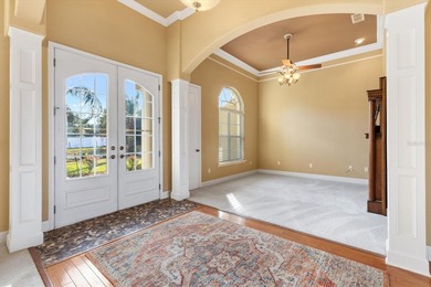 LAKES OF LADY LAKE - Executive-style Biscayne Custom on Lakes of Lady Lake Golf Course in Florida - for sale on GolfHomes.com, golf home, golf lot