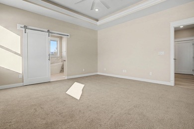 This newly built home in Cedaredge sits just to the north of Tee on Cedaredge Golf Course in Colorado - for sale on GolfHomes.com, golf home, golf lot