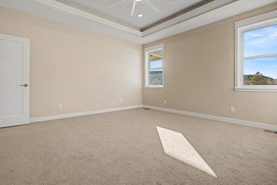 This newly built home in Cedaredge sits just to the north of Tee on Cedaredge Golf Course in Colorado - for sale on GolfHomes.com, golf home, golf lot