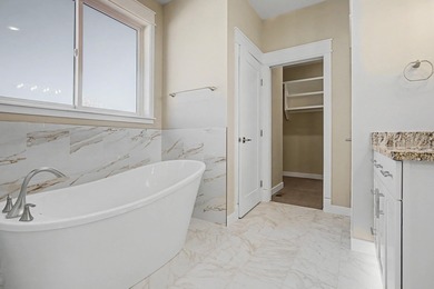 This newly built home in Cedaredge sits just to the north of Tee on Cedaredge Golf Course in Colorado - for sale on GolfHomes.com, golf home, golf lot