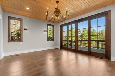 This delightful four-bedroom, four-and-a-half-bath home sits on on Trillium Links in North Carolina - for sale on GolfHomes.com, golf home, golf lot