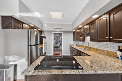 Welcome to this gorgeous 4-bedroom, 3.5-bathroom brick home on Houndslake Country Club in South Carolina - for sale on GolfHomes.com, golf home, golf lot