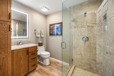 Dramatic lake, fairway and views of the Santa Rosa Mountains on Palm Royale Country Club in California - for sale on GolfHomes.com, golf home, golf lot