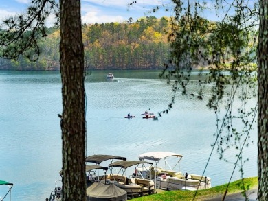 Marina Parc Villas showcase the crystal clear lake and marina on The Highlands Course at Lake Arrowhead in Georgia - for sale on GolfHomes.com, golf home, golf lot