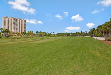 Luxury 2nd-floor unit overlooking JW Marriott Hammock Bay golf on Hammock Bay in Florida - for sale on GolfHomes.com, golf home, golf lot