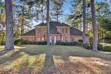 Welcome to this gorgeous 4-bedroom, 3.5-bathroom brick home on Houndslake Country Club in South Carolina - for sale on GolfHomes.com, golf home, golf lot
