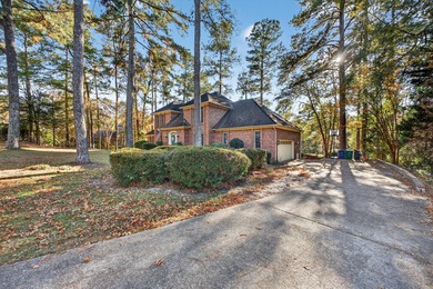 Welcome to this gorgeous 4-bedroom, 3.5-bathroom brick home on Houndslake Country Club in South Carolina - for sale on GolfHomes.com, golf home, golf lot