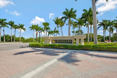 Luxury 2nd-floor unit overlooking JW Marriott Hammock Bay golf on Hammock Bay in Florida - for sale on GolfHomes.com, golf home, golf lot