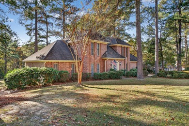 Welcome to this gorgeous 4-bedroom, 3.5-bathroom brick home on Houndslake Country Club in South Carolina - for sale on GolfHomes.com, golf home, golf lot
