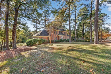 Welcome to this gorgeous 4-bedroom, 3.5-bathroom brick home on Houndslake Country Club in South Carolina - for sale on GolfHomes.com, golf home, golf lot