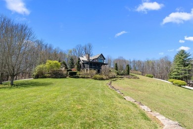 This delightful four-bedroom, four-and-a-half-bath home sits on on Trillium Links in North Carolina - for sale on GolfHomes.com, golf home, golf lot