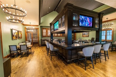 This delightful four-bedroom, four-and-a-half-bath home sits on on Trillium Links in North Carolina - for sale on GolfHomes.com, golf home, golf lot