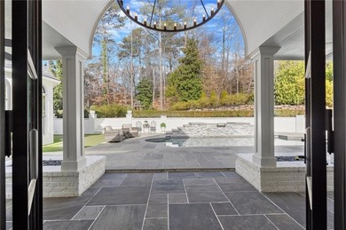 Tucked away on a quiet cul-de-sac in the prestigious Atlanta on Atlanta Country Club in Georgia - for sale on GolfHomes.com, golf home, golf lot