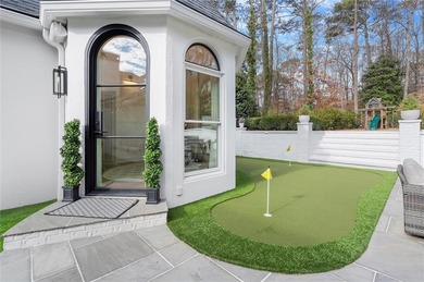 Tucked away on a quiet cul-de-sac in the prestigious Atlanta on Atlanta Country Club in Georgia - for sale on GolfHomes.com, golf home, golf lot