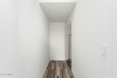 Picturesque Pinnacle Peak mountain, sunset and city light views on Troon Country Club in Arizona - for sale on GolfHomes.com, golf home, golf lot