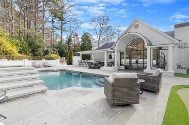 Tucked away on a quiet cul-de-sac in the prestigious Atlanta on Atlanta Country Club in Georgia - for sale on GolfHomes.com, golf home, golf lot