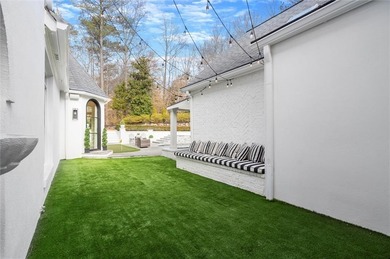 Tucked away on a quiet cul-de-sac in the prestigious Atlanta on Atlanta Country Club in Georgia - for sale on GolfHomes.com, golf home, golf lot