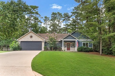 Nestled within the serene landscapes of Rayburn Country Resort on Rayburn Country Club in Texas - for sale on GolfHomes.com, golf home, golf lot