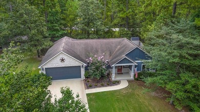 Nestled within the serene landscapes of Rayburn Country Resort on Rayburn Country Club in Texas - for sale on GolfHomes.com, golf home, golf lot