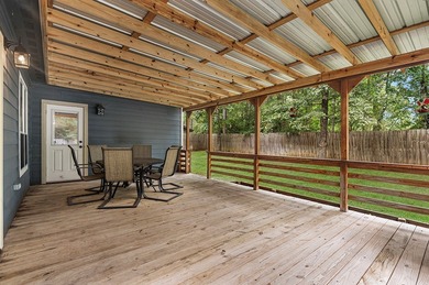 Nestled within the serene landscapes of Rayburn Country Resort on Rayburn Country Club in Texas - for sale on GolfHomes.com, golf home, golf lot