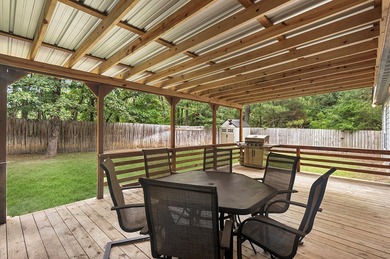 Nestled within the serene landscapes of Rayburn Country Resort on Rayburn Country Club in Texas - for sale on GolfHomes.com, golf home, golf lot