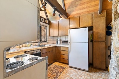 Step back in time with this iconic 1970s custom A-frame lake on Buckingham Golf and Country Club in California - for sale on GolfHomes.com, golf home, golf lot