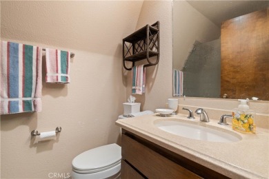 Step back in time with this iconic 1970s custom A-frame lake on Buckingham Golf and Country Club in California - for sale on GolfHomes.com, golf home, golf lot