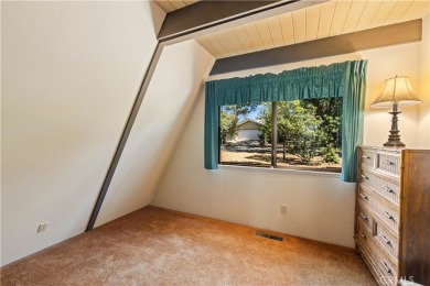 Step back in time with this iconic 1970s custom A-frame lake on Buckingham Golf and Country Club in California - for sale on GolfHomes.com, golf home, golf lot
